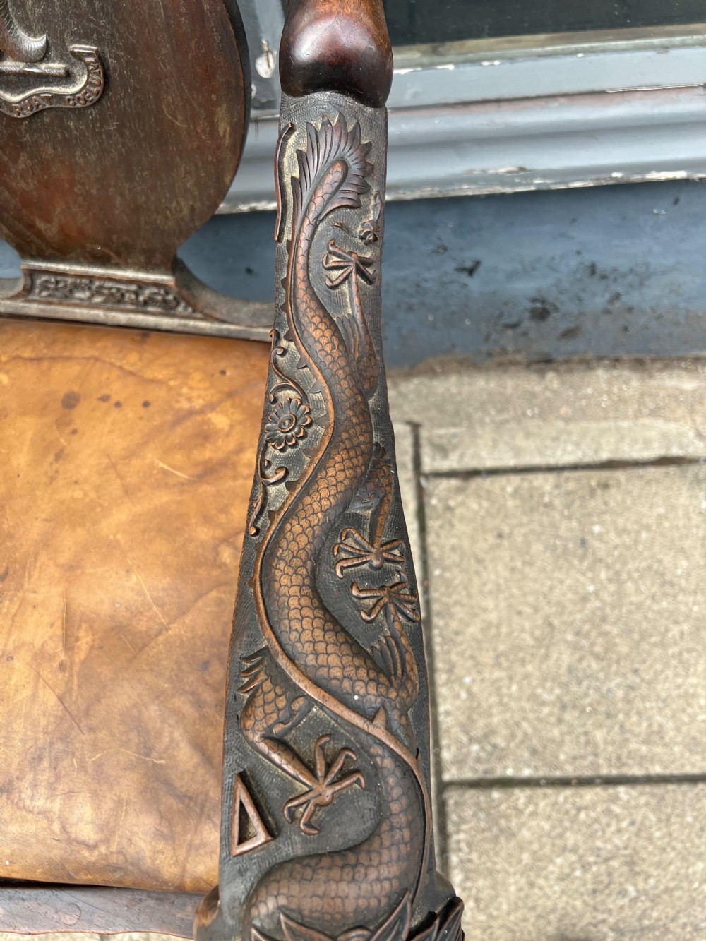 A pair of early C19th Chinese armchairs with crest to centre  View X