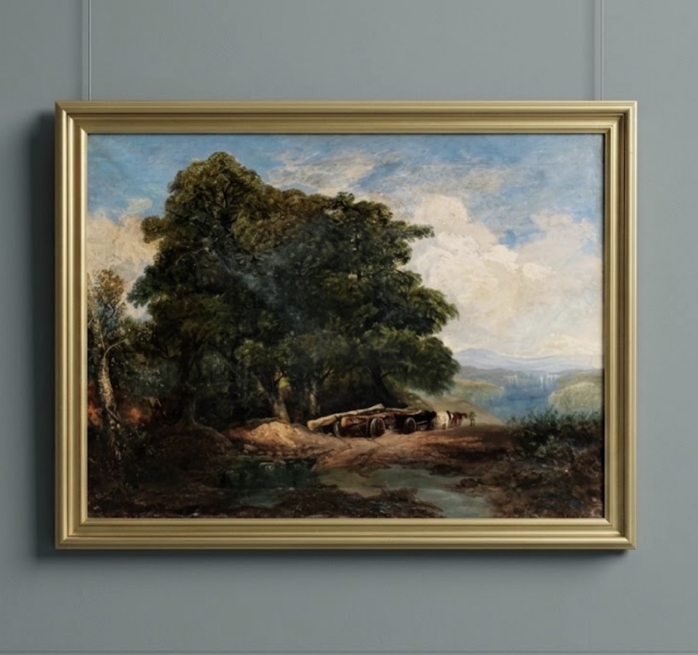 A nineteenth-century British oil painting on canvas depicting a rural landscape with woodland trees and a timber cart set within a moulded gilt frame.