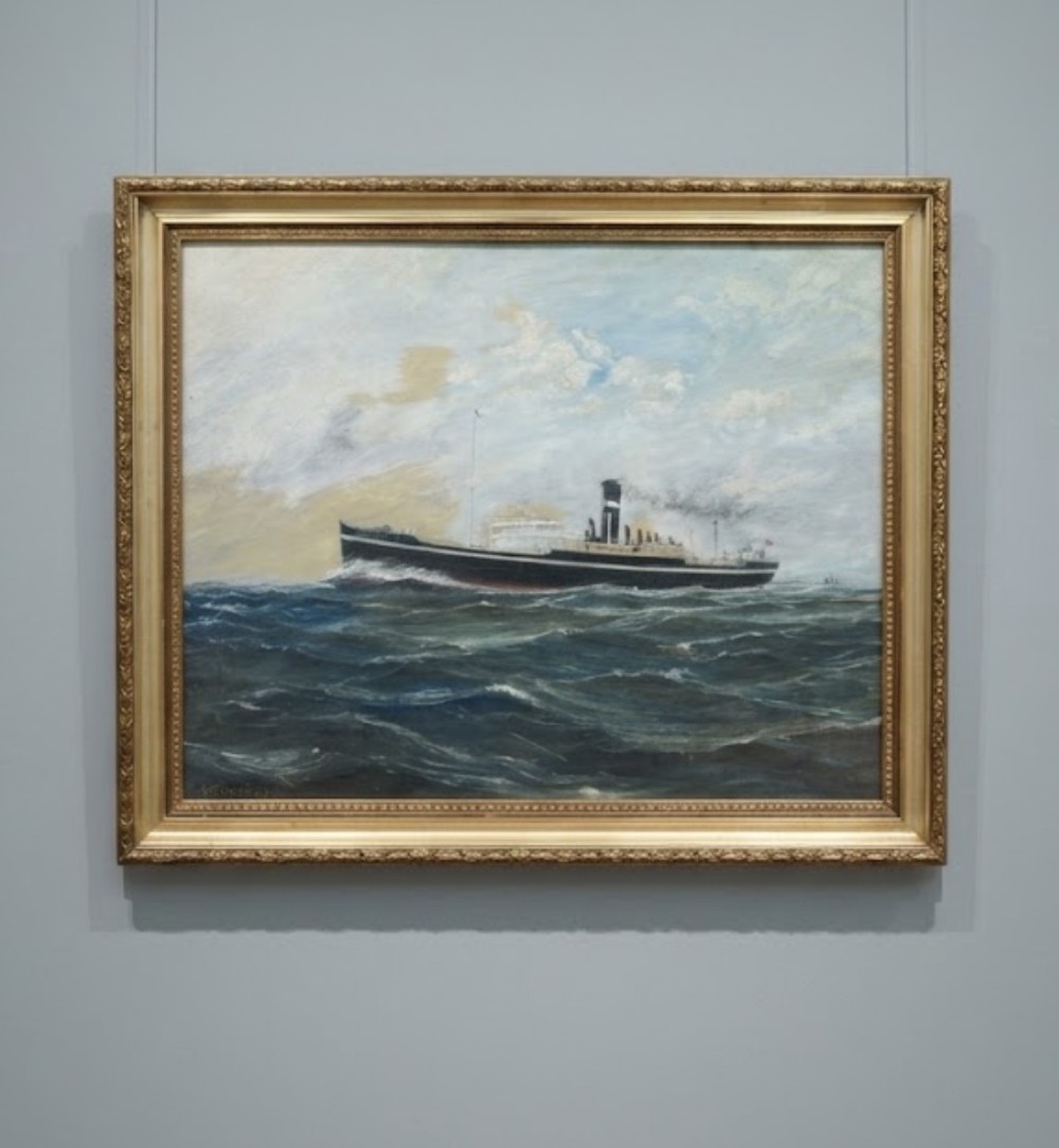 An oil painting on board depicting a black steamship navigating a blue sea with white waves, presented in a moulded gilt frame.