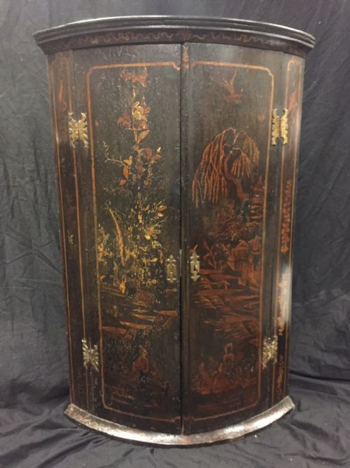 fig 1. C18th bow fronted lacquered chinoiserie corner cupboard