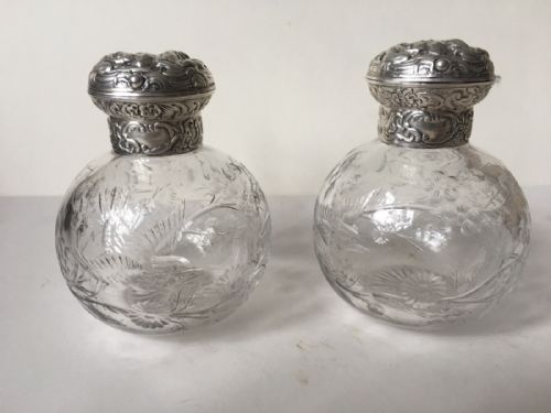 A Pair of Silver Topped Hm Perfume Bottles