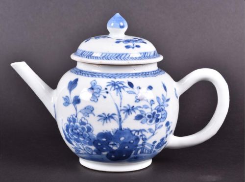 13. A Late 18th Century Chinese Blue and White Porcelain Teapot
decorated with Foliate Motifs.