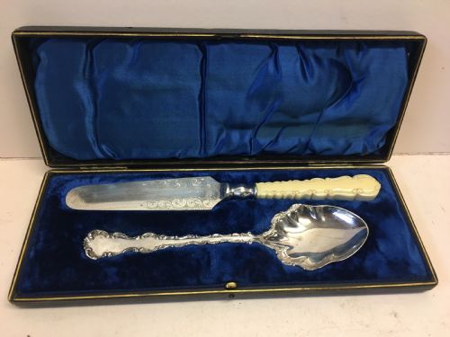 Pair of Silver Plated Servers in a Fitted Case.