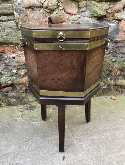 A Georgian Mahogany Brass Bound Wine Cooler.
