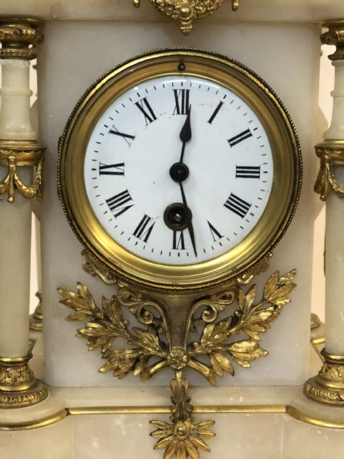 fig 1. C19th french alabaster and ormolu mantle clock