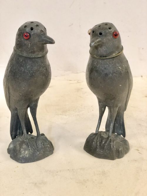 A Novelty Pair of Spelter Pepper Pots  Modelled as Birds