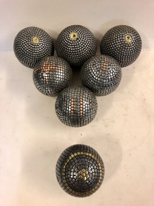 A Collection of Seven French Pétanque Boules.