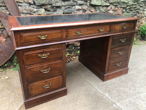 C19th Walnut Nine Drawer Pedestal Desk with Inset Leather Top