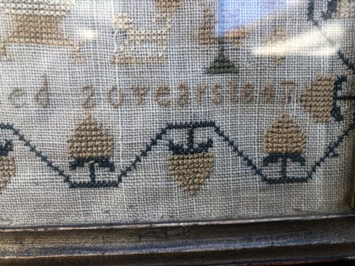 fig 1. C19th woolwork sampler by Charlotte Hissy 1847