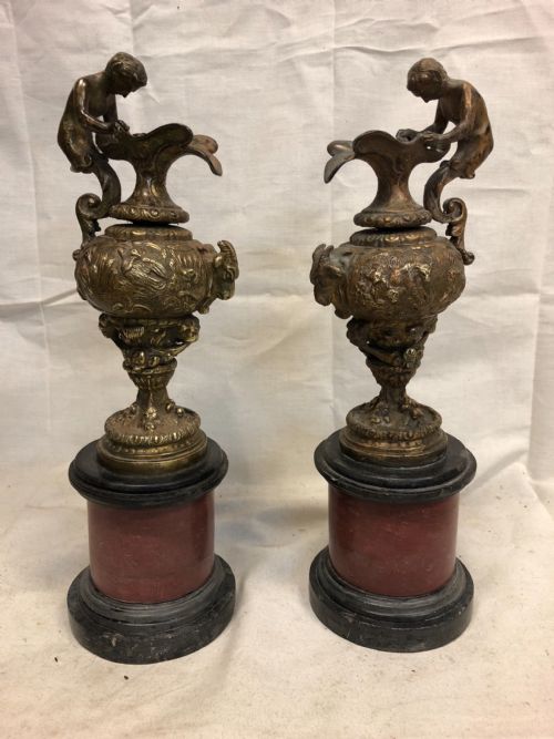 Pair of Classical Gilt Bronze Urns on Marble Bases