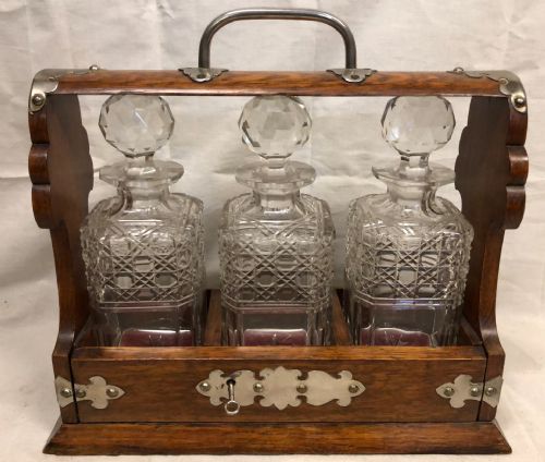 C19th Oak and Silver Plated Three Bottle Tantalus