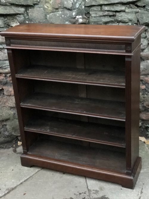 A Small Victorian Walnut Bookcase with Three Adjustable Shelves