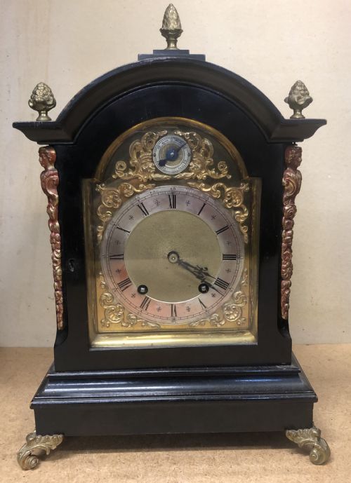 An Ebonised Georgian Style Bracket Clock.

