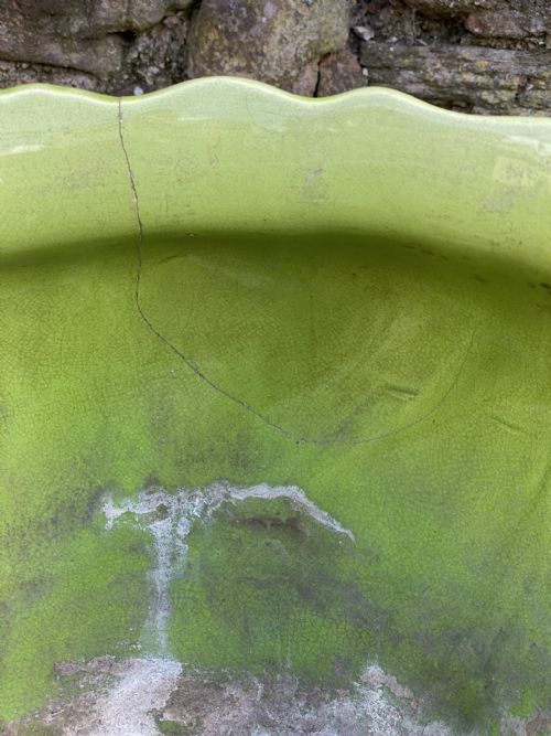 fig 1. A Victorian majolica green glazed jardinaire and stand 