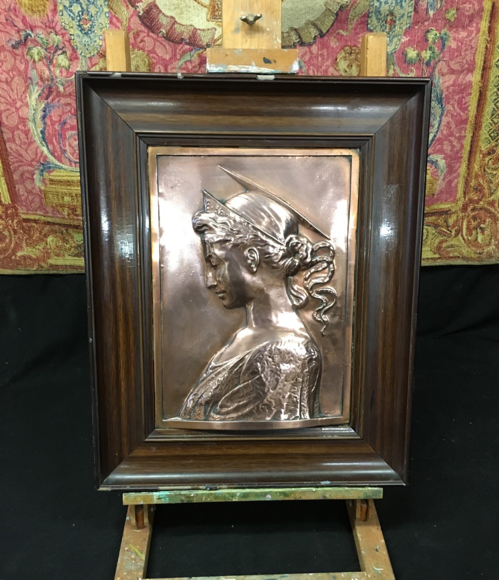 C19th Copper embossed plaque in a painted wooden frame, in the pre raphaelite taste