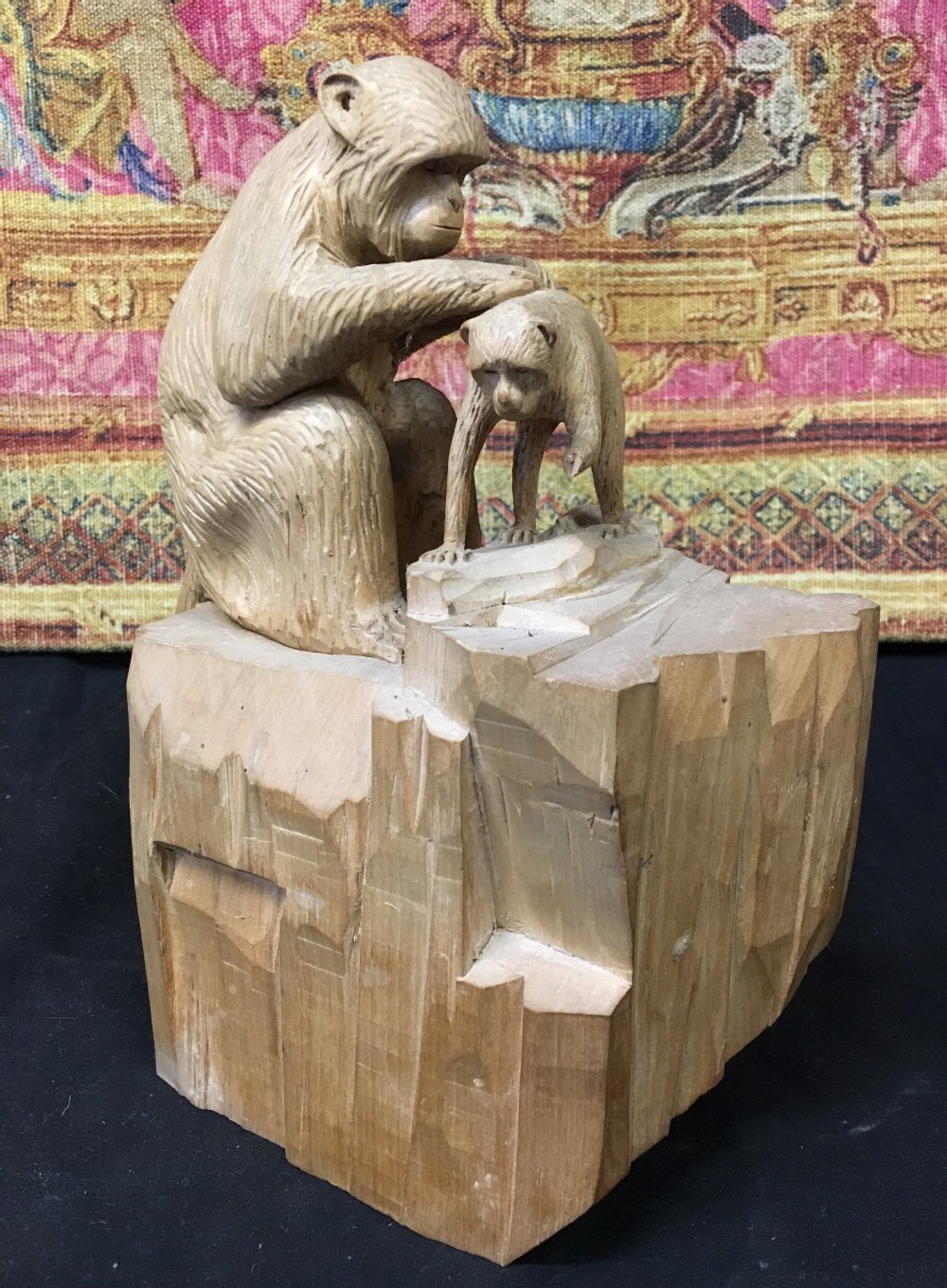 C20th limewood carving of a monkey tending its baby
