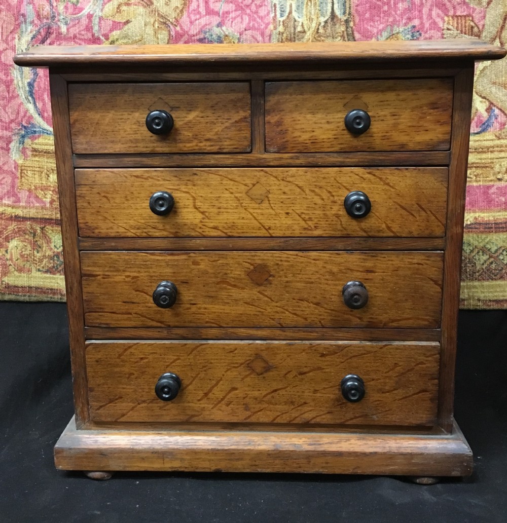 C19th miniature oak set of drawers