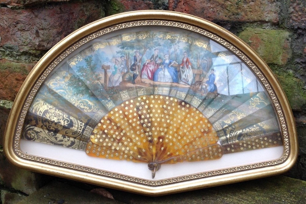 C18th hand painted fan in a modern gilt frame