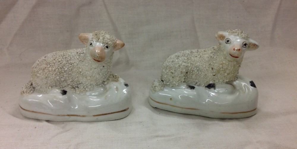 Two miniature Staffordshire sheep