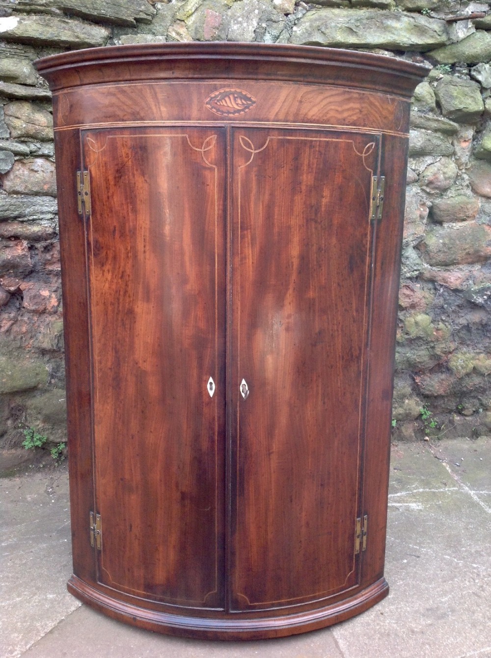 C18th barrell fronted corner cupboard