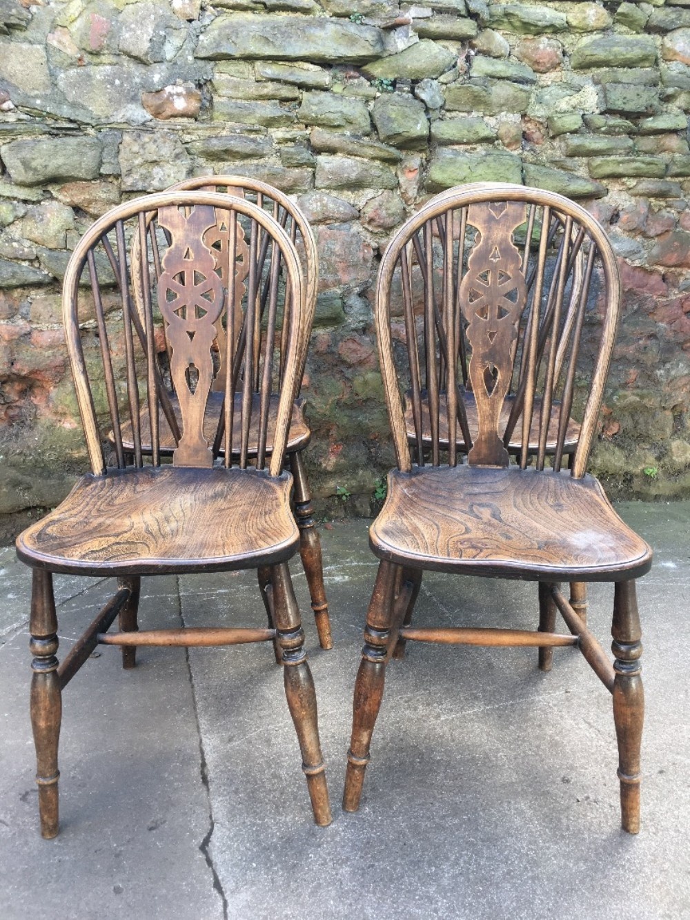 Set of four Windsor wheelback kitchen chairs 
