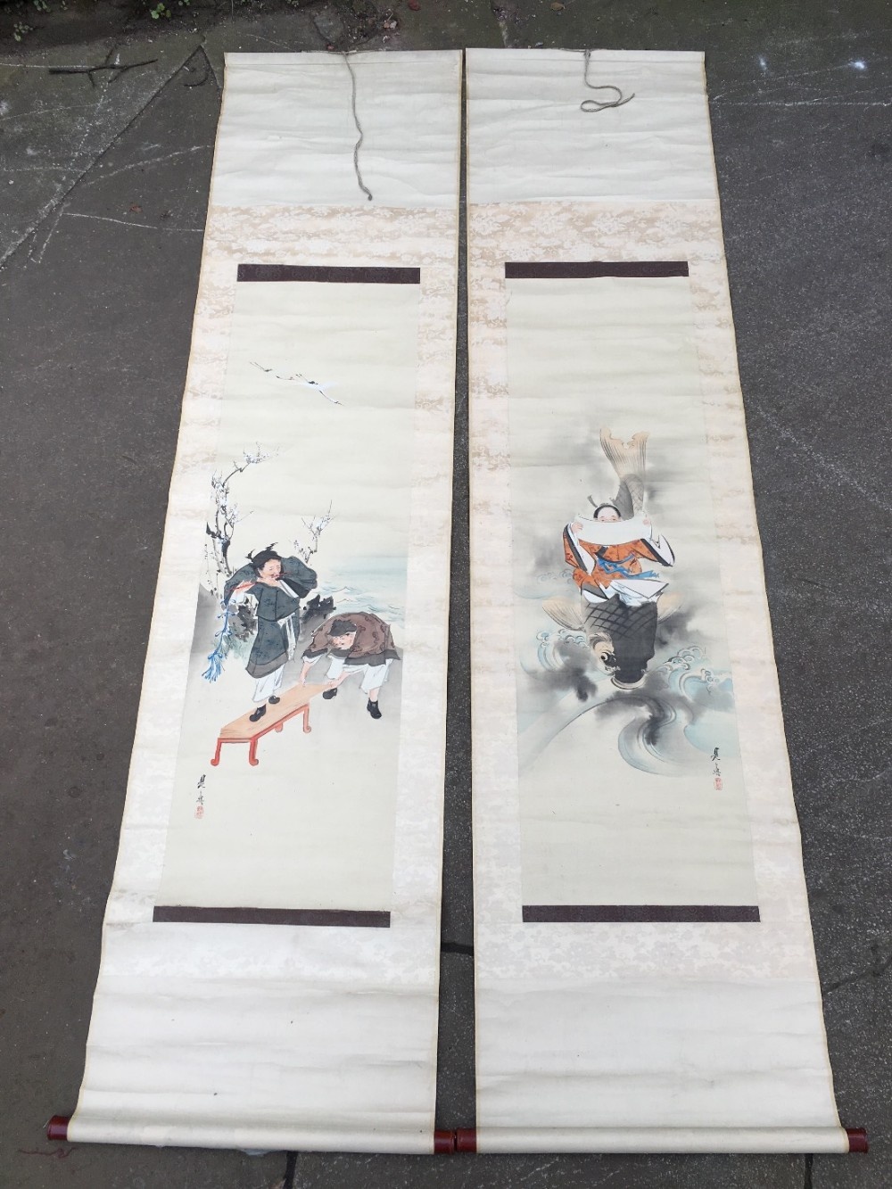 A pair of C19th hand painted Chinese scrolls