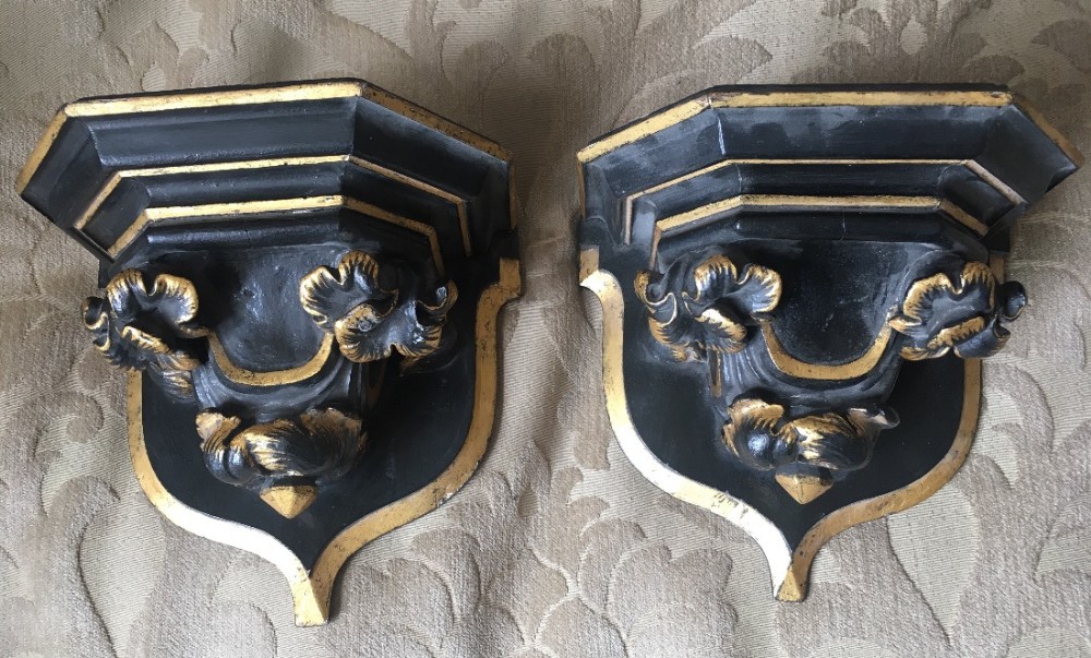 Pair of wall brackets in the gothic taste