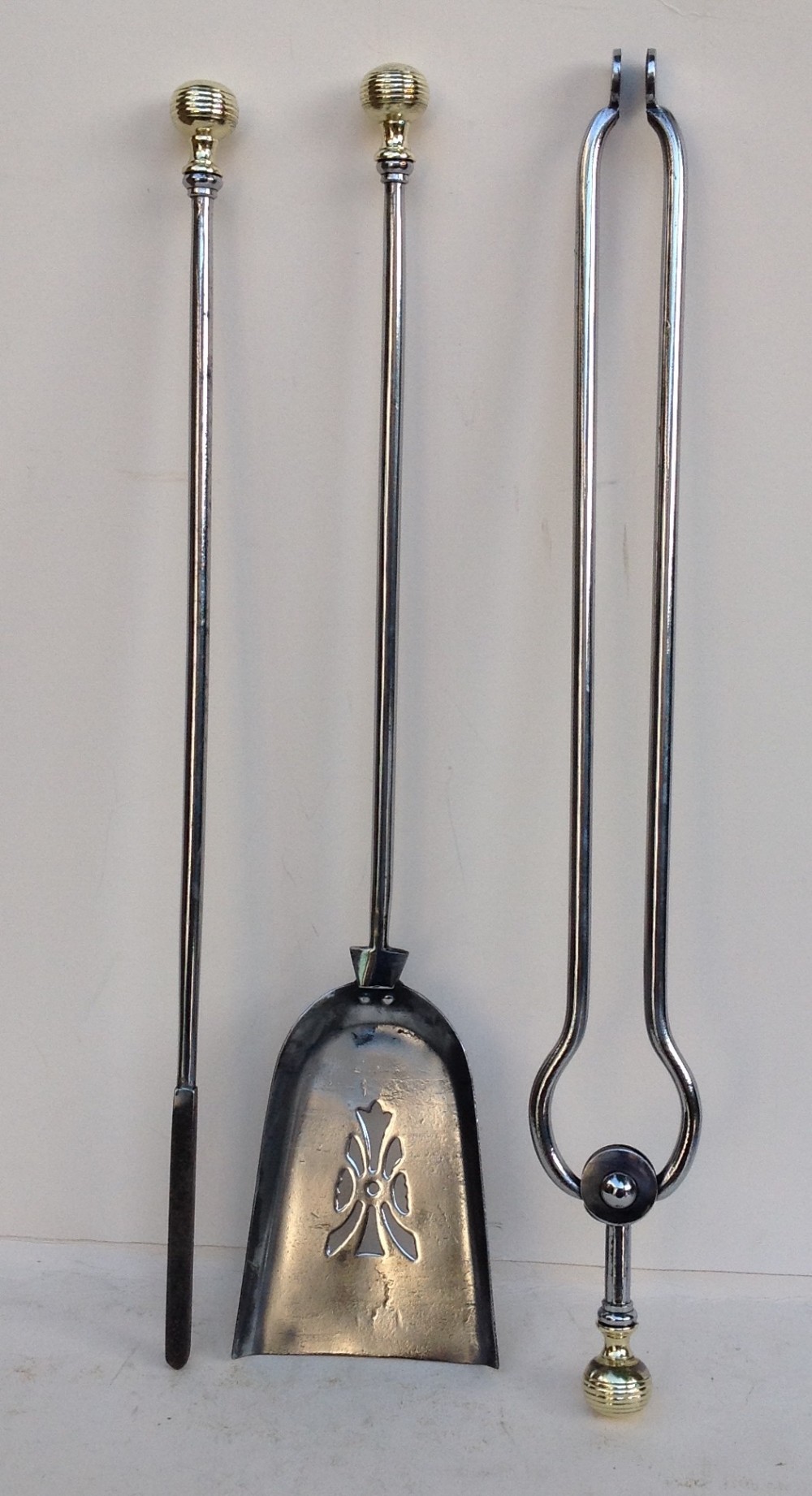 Set of three steel and brass fire irons