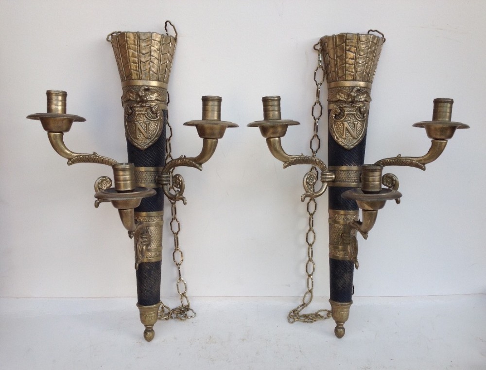 A pair of napoleonic empire style 1930s wall lights