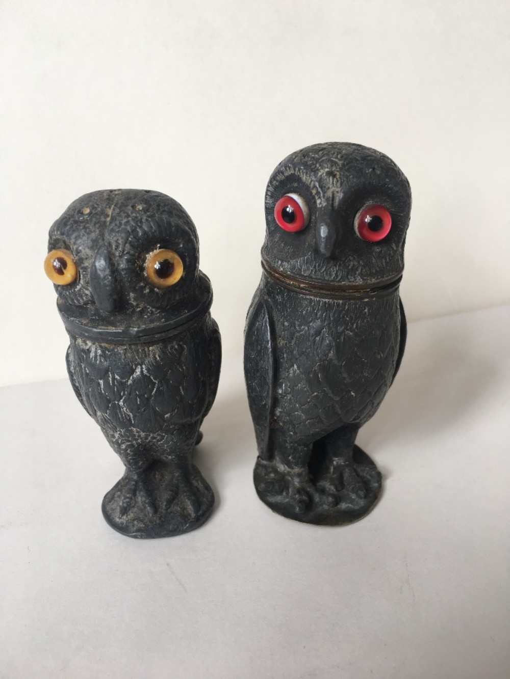 Two pewter pepper pots modelled as owls
