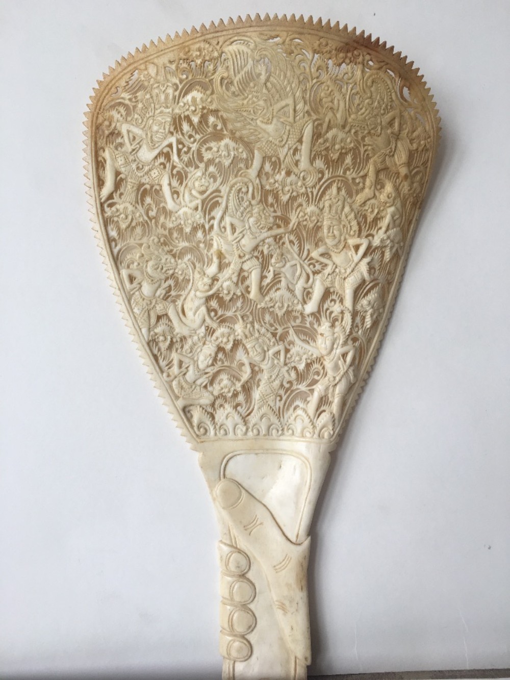 Finely carved fan from Thailand