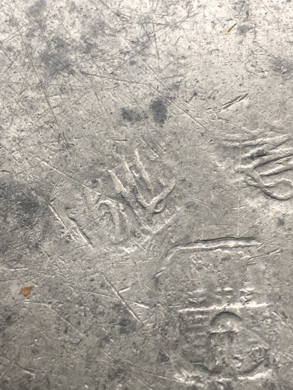 A pair of pewter engraved plates View II