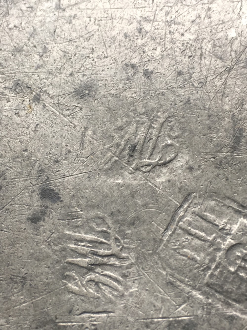 A pair of pewter engraved plates View III