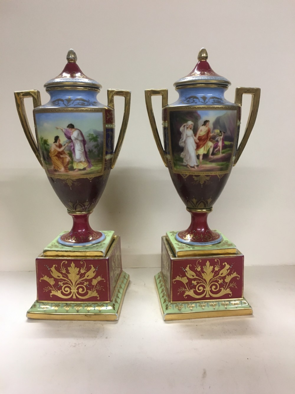 Pair of royal Vienna urns on stands View II