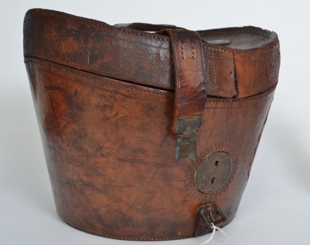 A 19th century stitched tanned leather Hat box