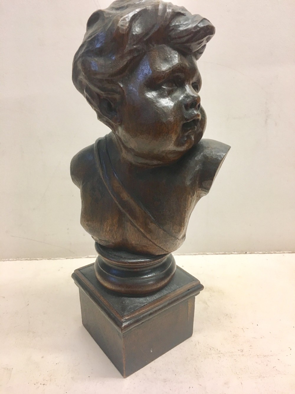 C19th carved wood cherub 