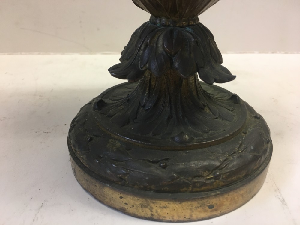 C19th gilt classical metal vase with cherub decoration View III
