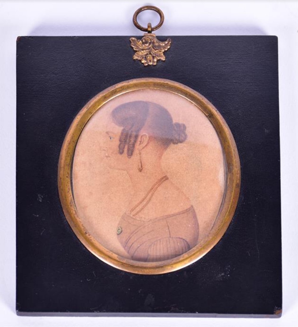 A 19th American portrait miniature depicting a young lady