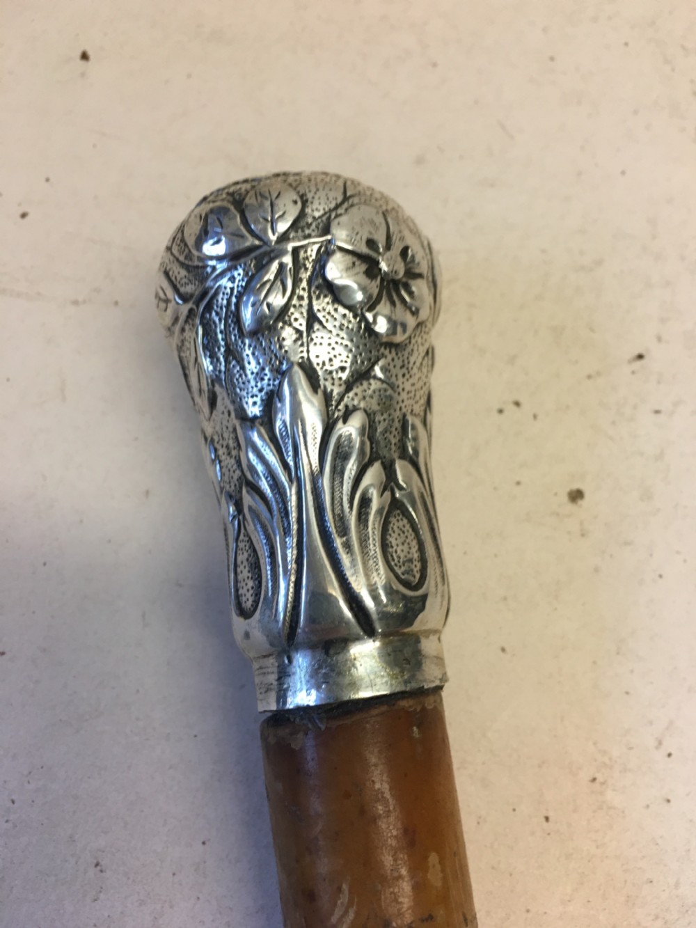 C19th walking cane with white metal embossed handle View II