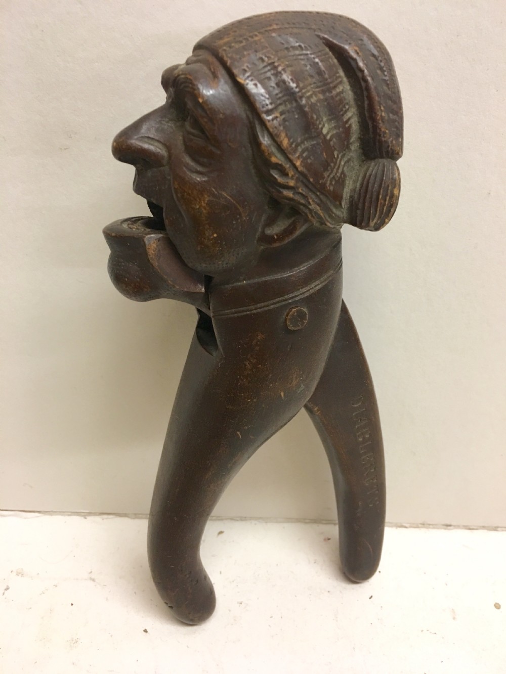 C19th Swiss carving of a man modelled as a nut cracker.