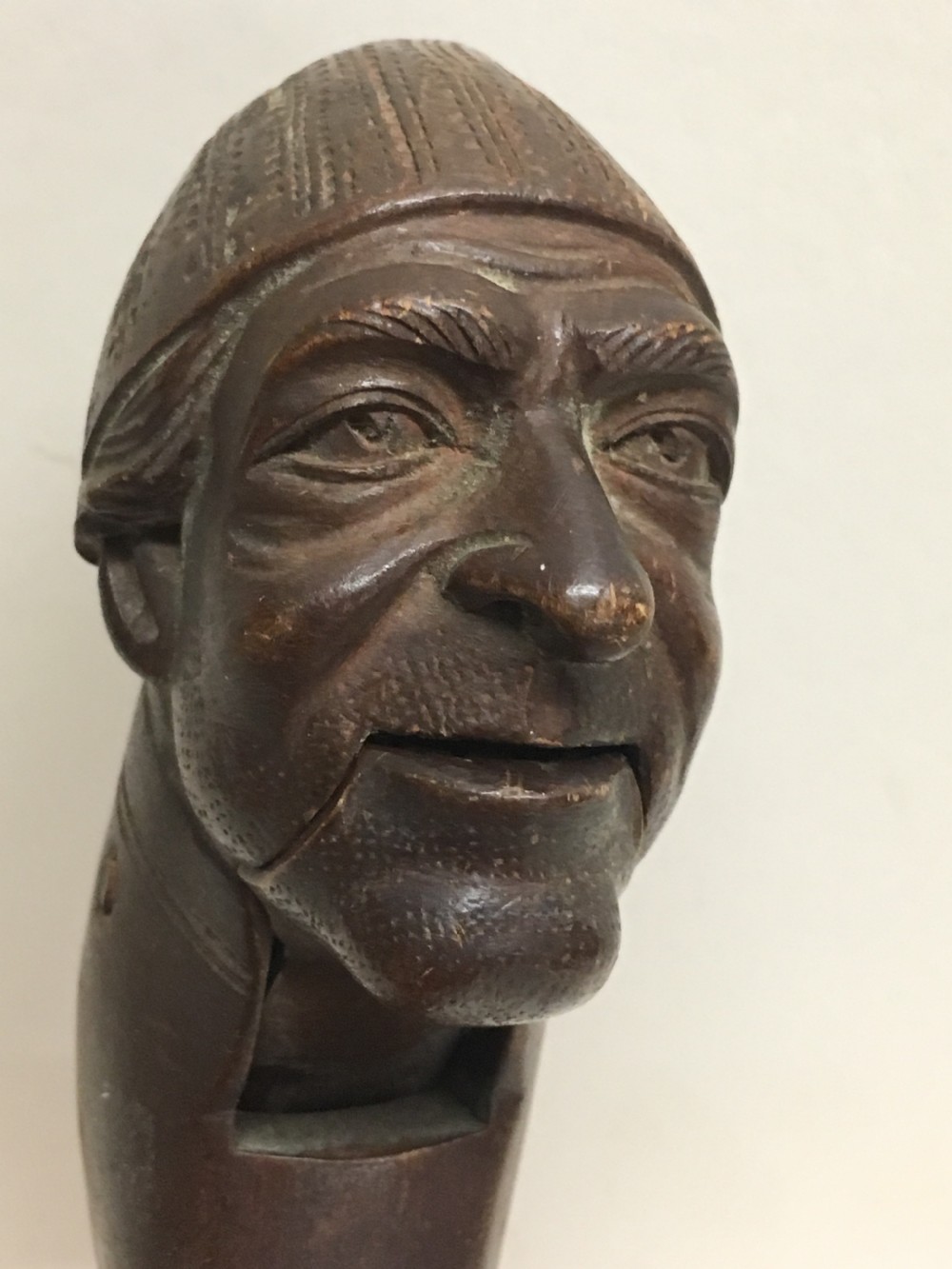 C19th Swiss carving of a man modelled as a nut cracker. View VI