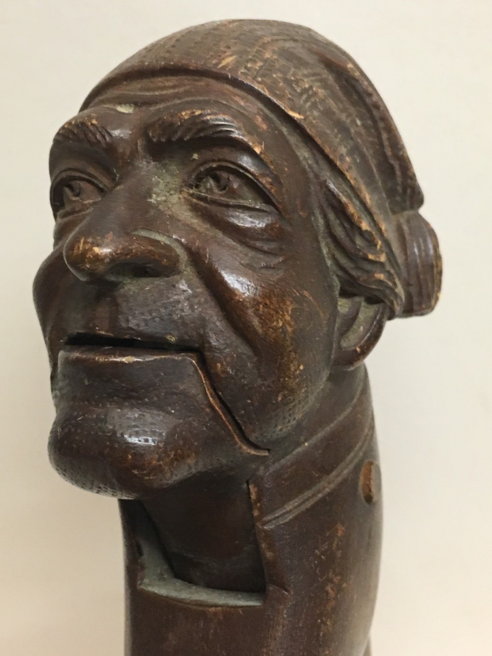 C19th Swiss carving of a man modelled as a nut cracker. View VII