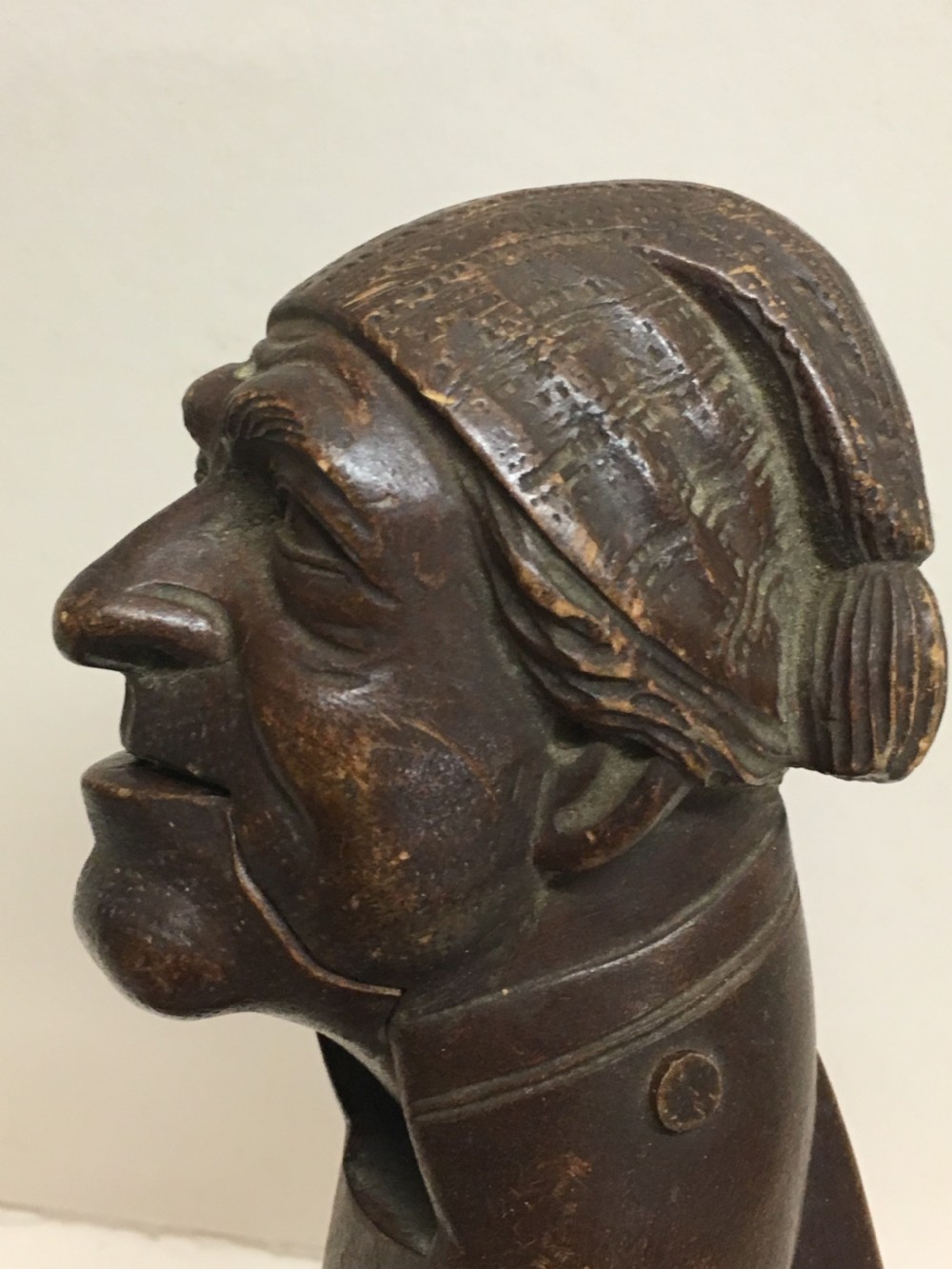 C19th Swiss carving of a man modelled as a nut cracker. View VIII