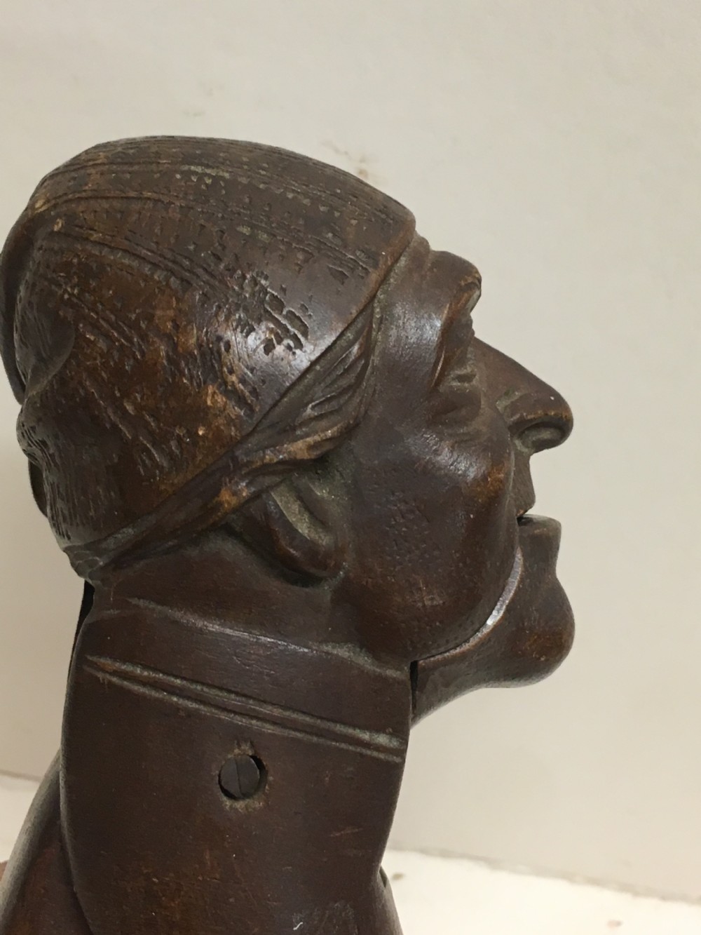 C19th Swiss carving of a man modelled as a nut cracker. View IX