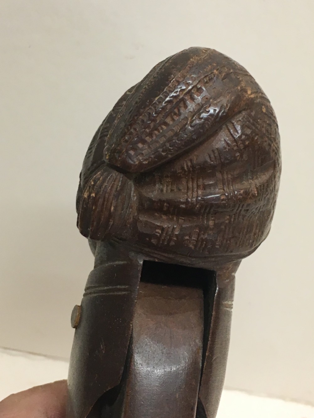 C19th Swiss carving of a man modelled as a nut cracker. View X