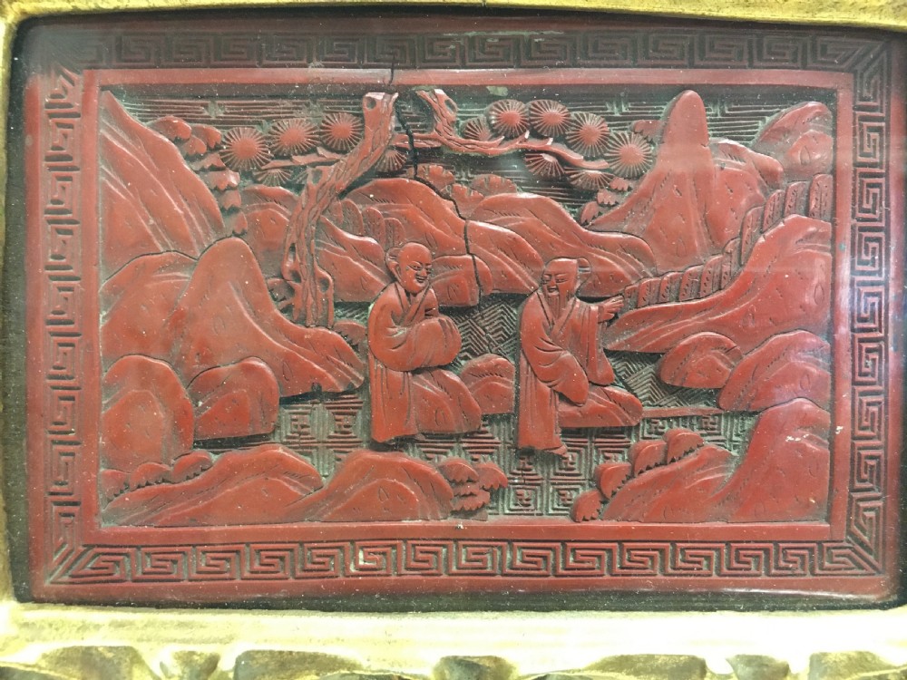 C19th cinnabar lacquered panel in carved gilt wood frame View II