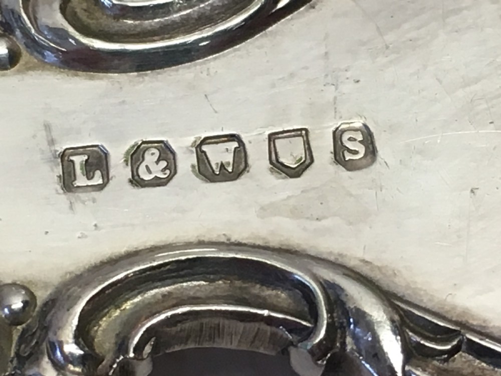 Pair of silver plated servers in a fitted case. View V