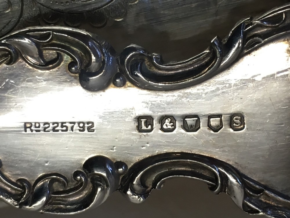 Pair of silver plated servers in a fitted case. View VI