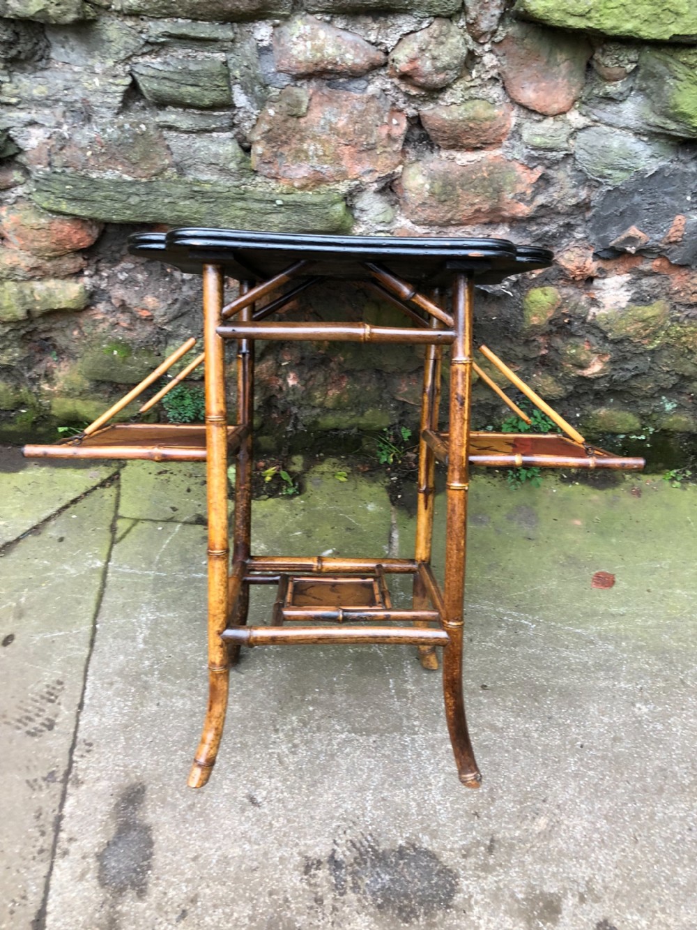 Edwardian lacquered bamboo table with two adjustable shelves View VIII