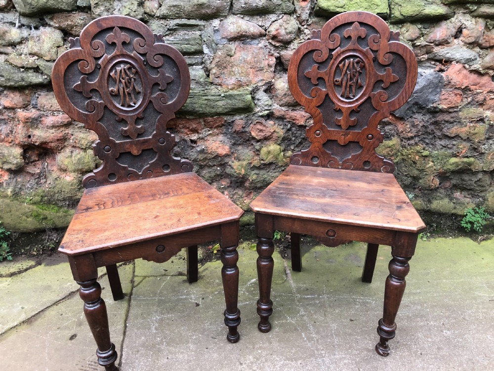 C19th pair of oak hall chairs
